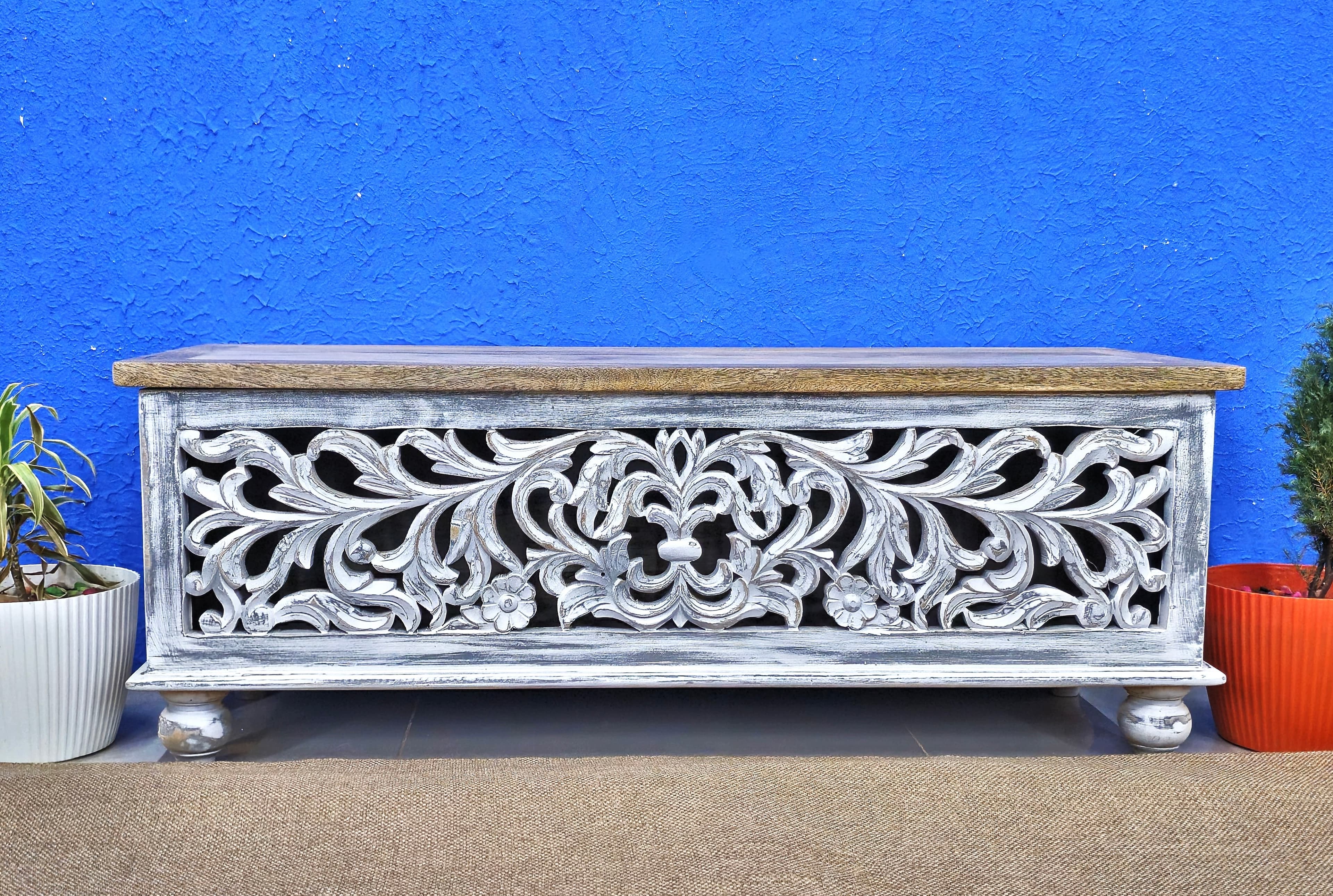 Hand-carved wooden sideboard with intricate floral design